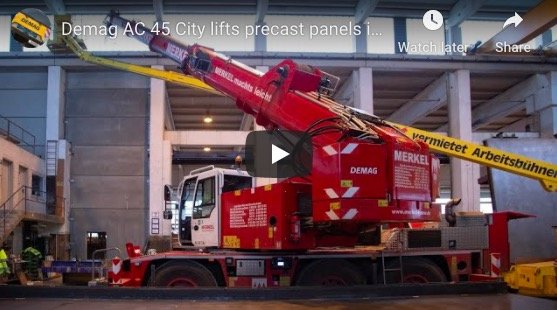 Demag AC 45 City lifts precast panels inside shop floor